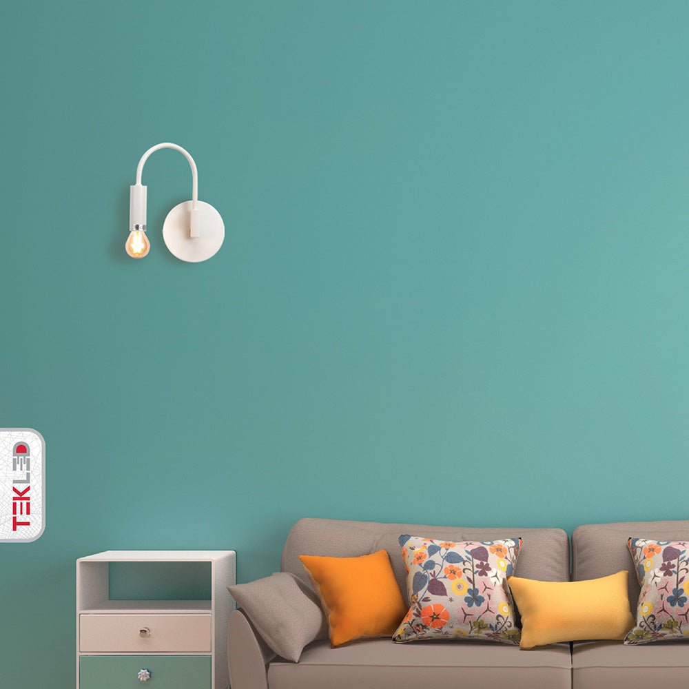 Indoor setting of Matte White Swan Wall Light with E14 Fitting