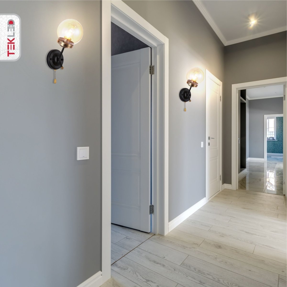 Amber Glass Antique Brass And Black Globe Wall Light E27 And Pull Down Switch in indoor setting hallway entrance