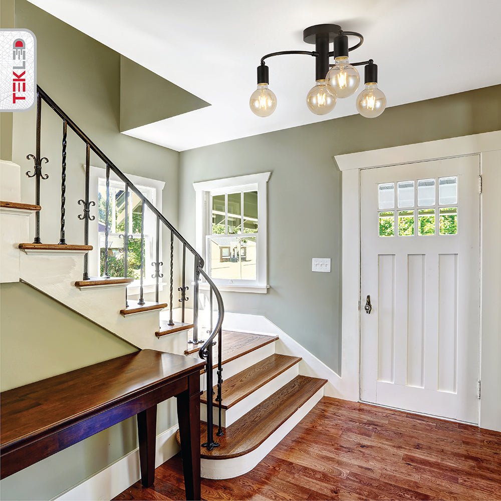 Black metal ceiling light with 4xe27 fitting in indoor setting hallway entrance