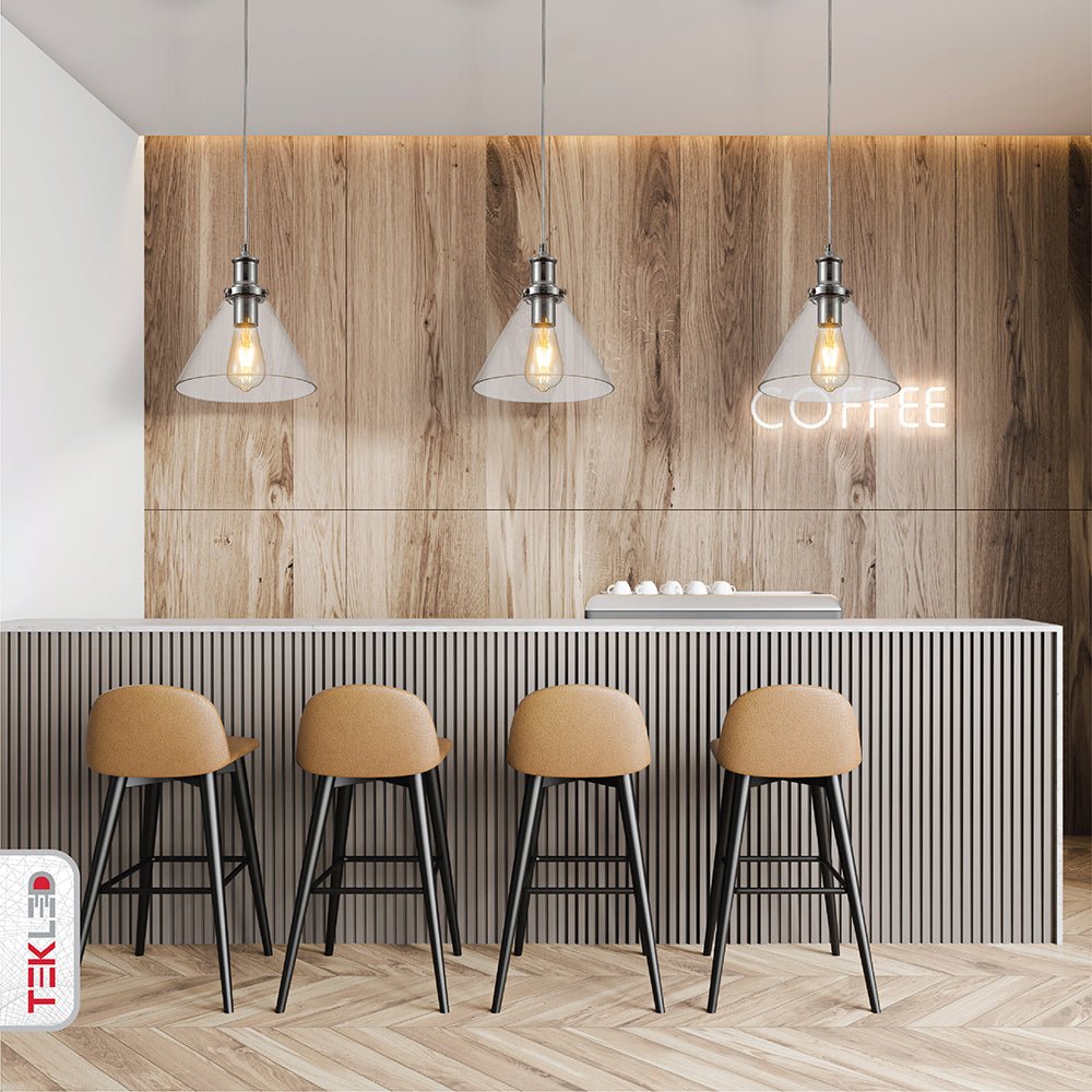 Chrome metal clear glass funnel pendant light with e27 fitting in indoor setting cafe bar top