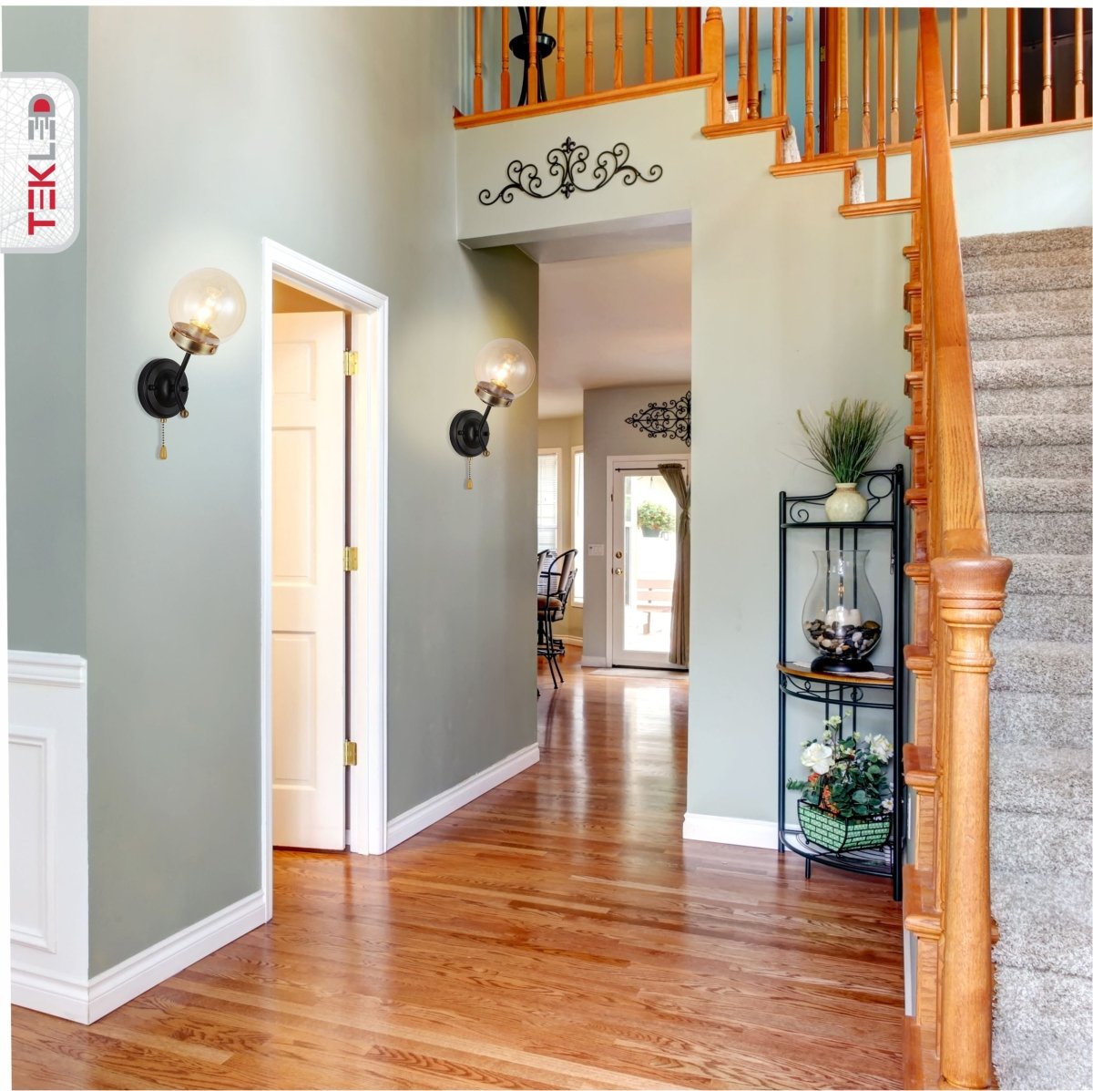 Amber Glass Antique Brass And Black Globe Wall Light E27 And Pull Down Switch in indoor setting hallway
