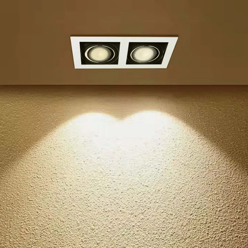 Sleek GU10 downlight fixture illuminates a modern kitchen, enhancing its chic decor with stylish, adjustable lighting.143-03444